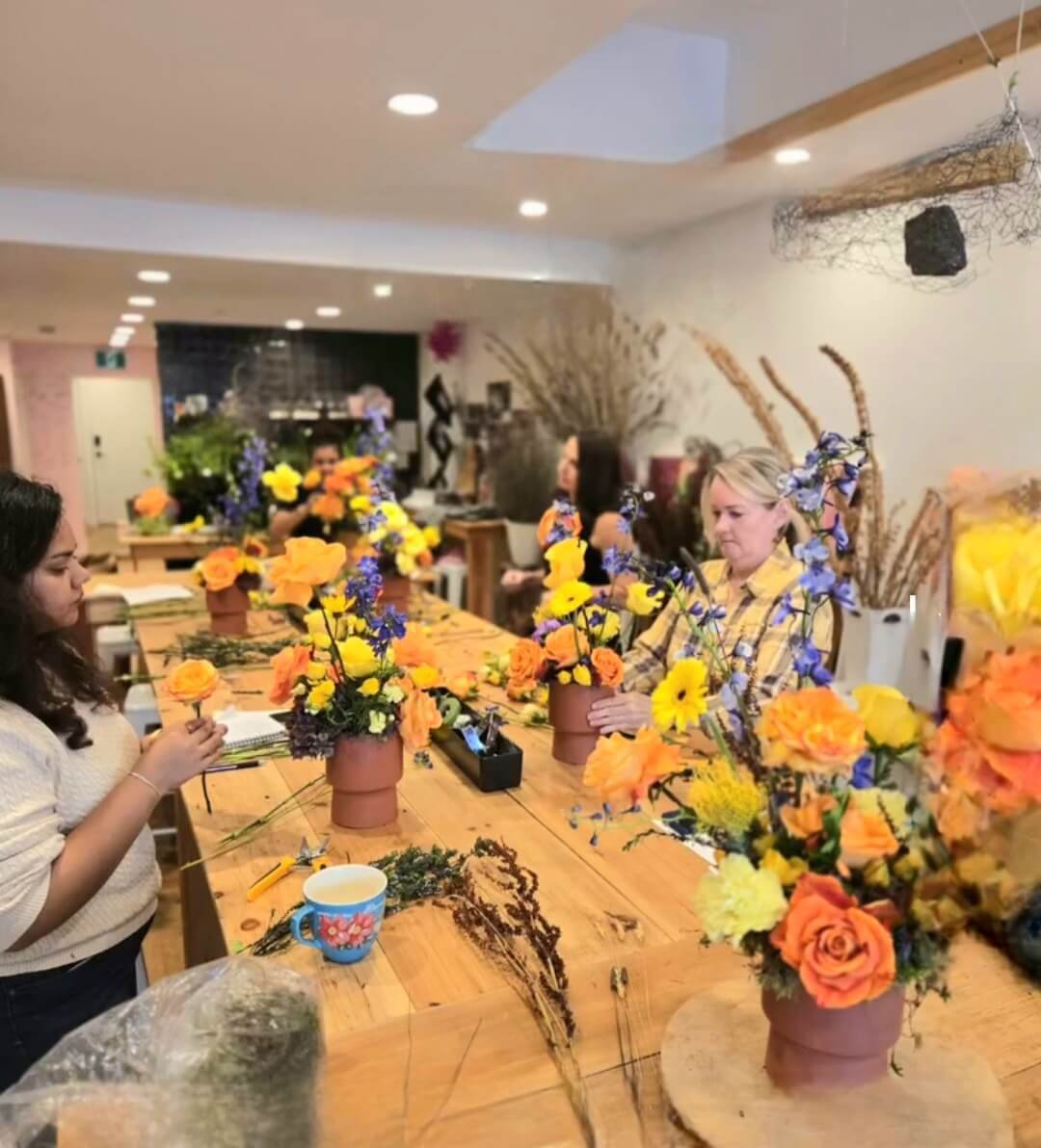 Garden style table top arrangement at Toronto Flower School
