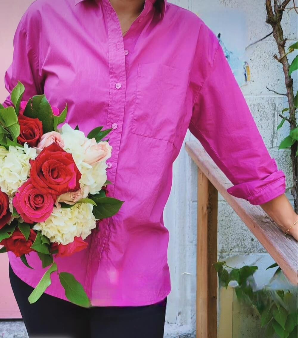 Student holding a spiral tied bouquet