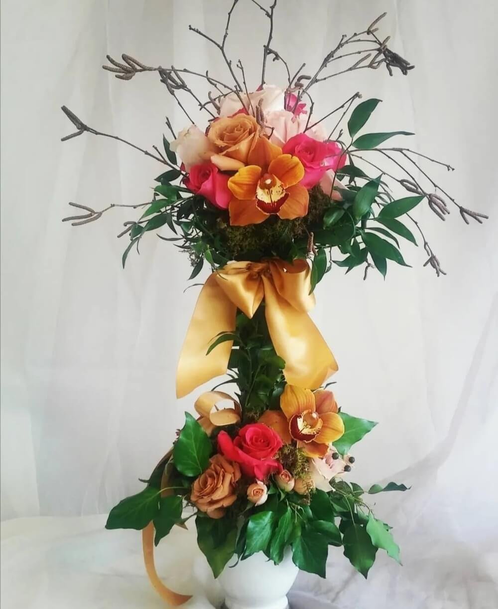 High petal count roses arranged as a topiary